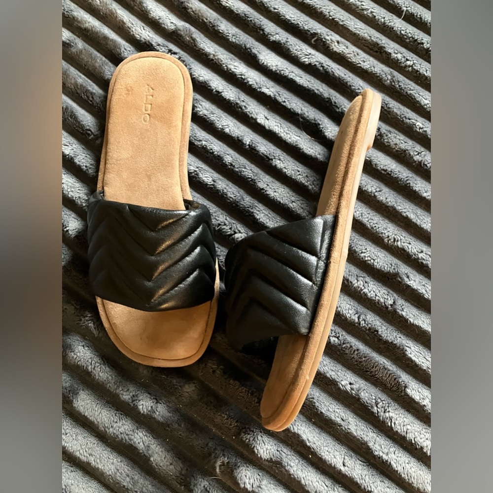 Aldo  black leather women’s slide. Unworn size 9